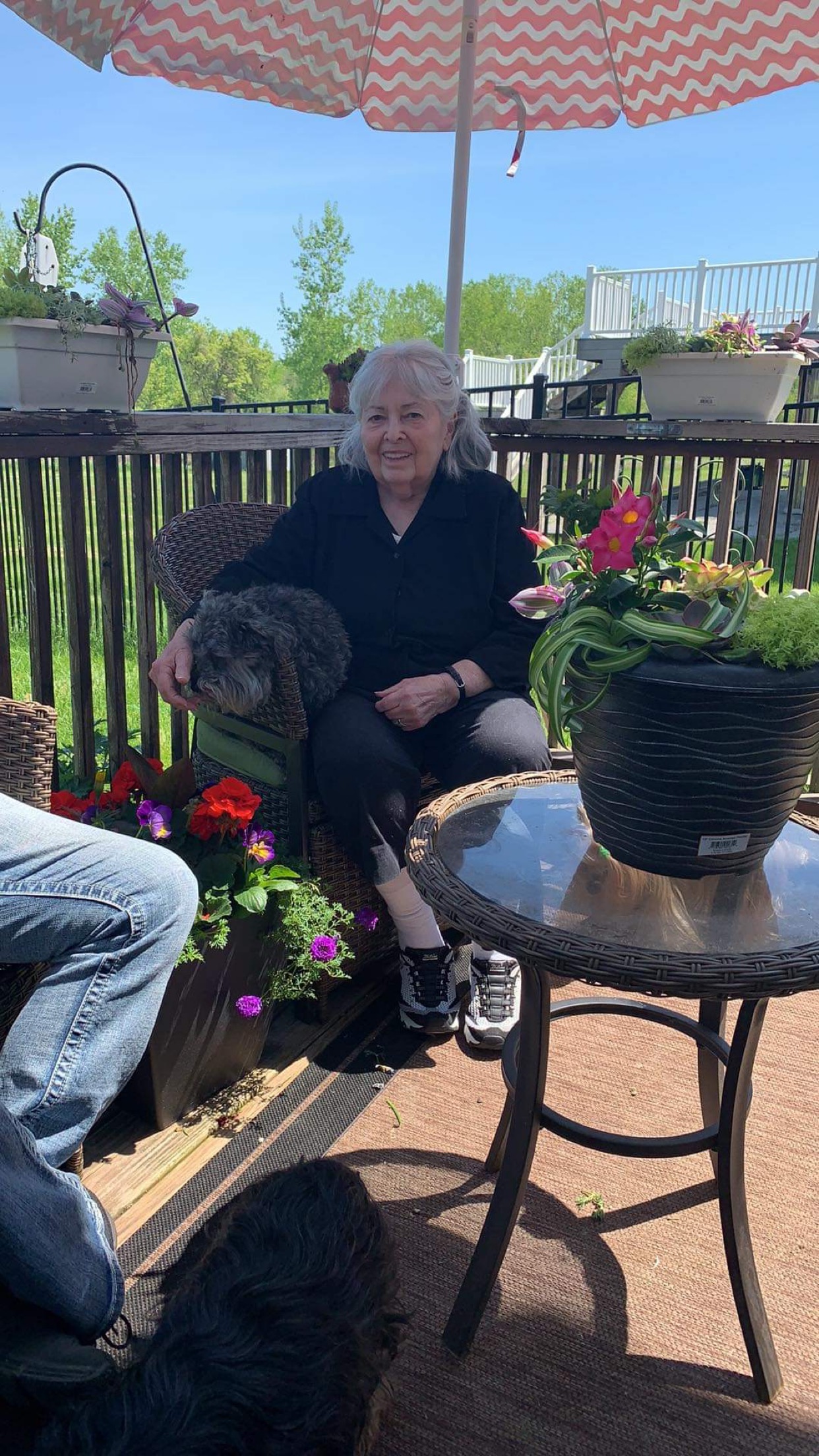 Janet sitting on her deck