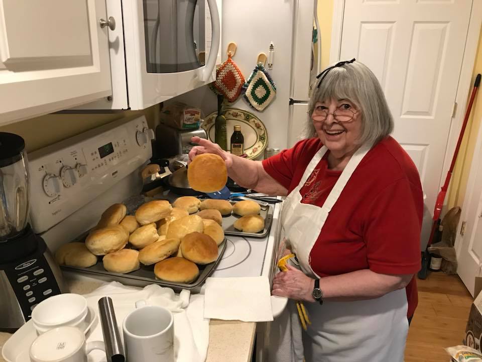 Janet making dinner rolls