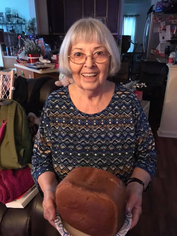 Janet with a loaf of home-made bread